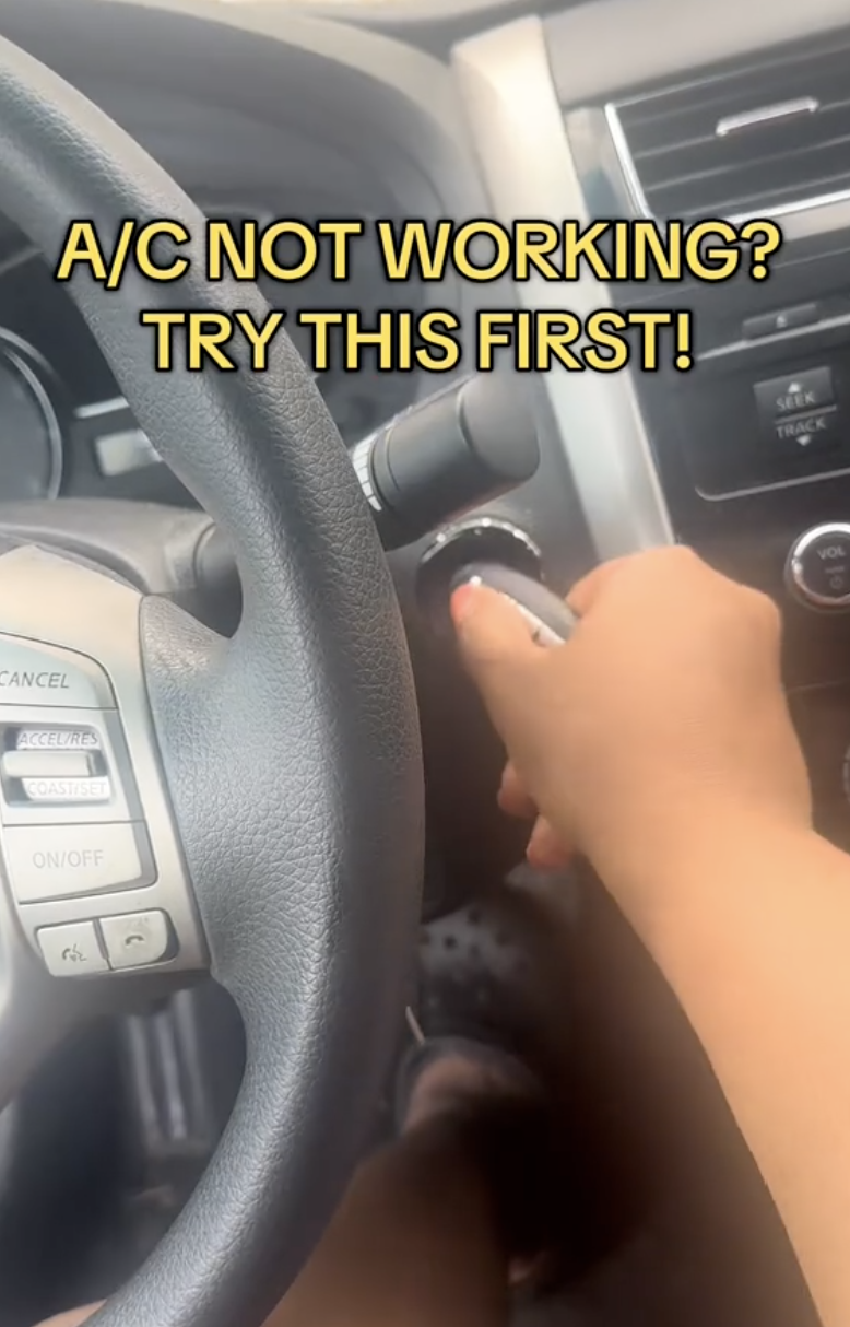 woman sitting in her car